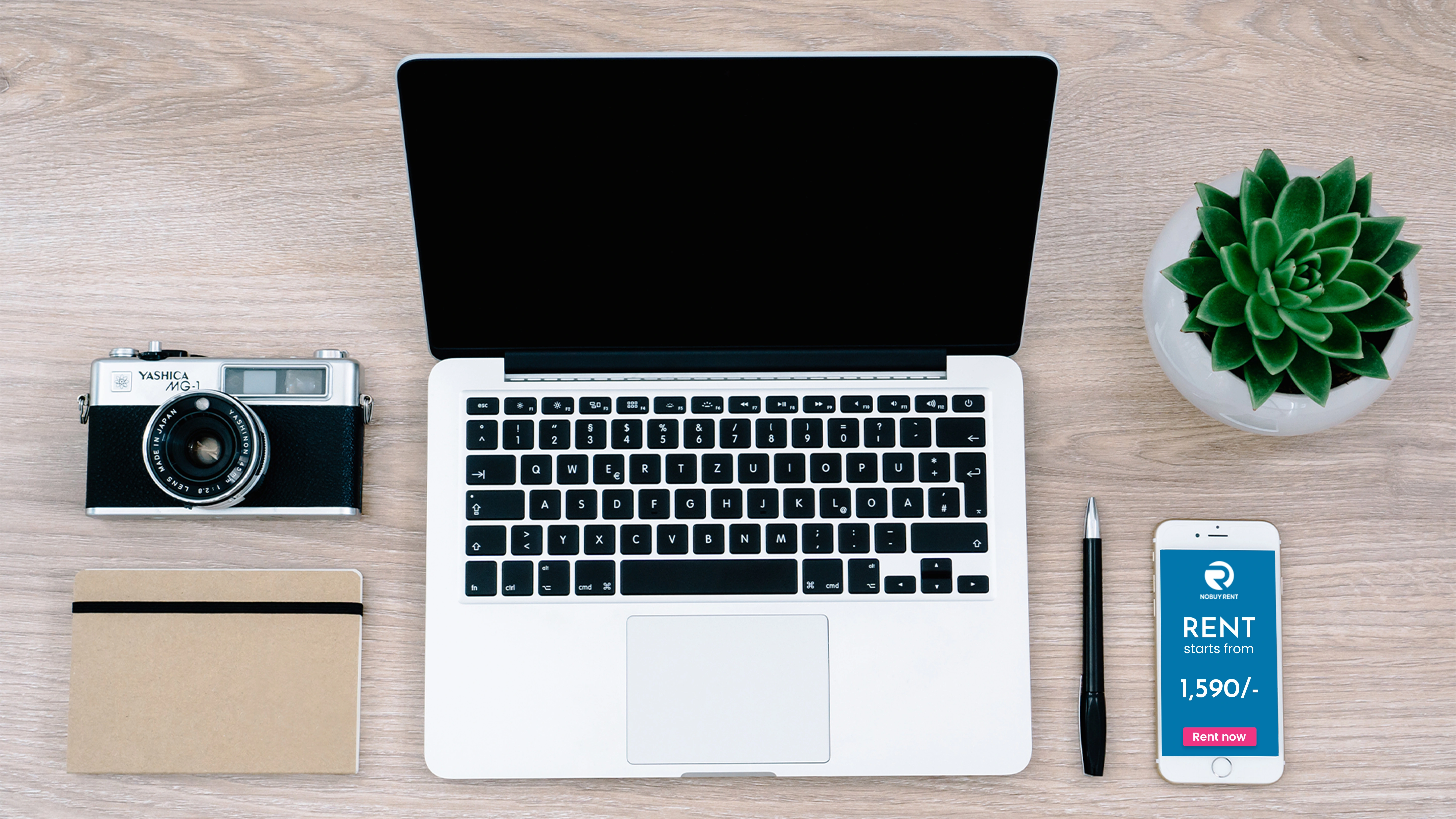 A flat lay of trending gadgets like tablets, cameras, and smartwatches available for rent in India