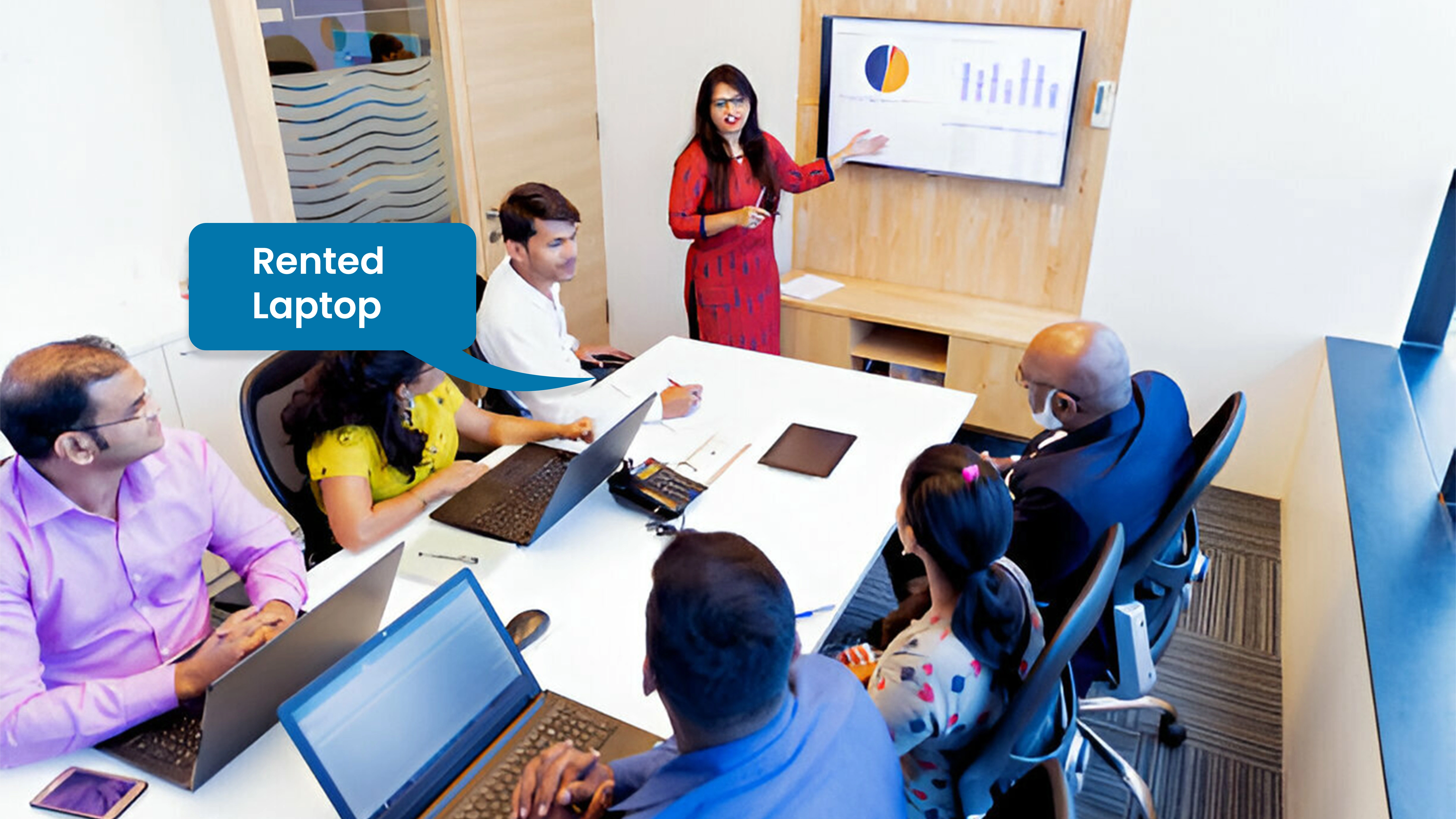 A startup team working on rented laptops in a co-working space
