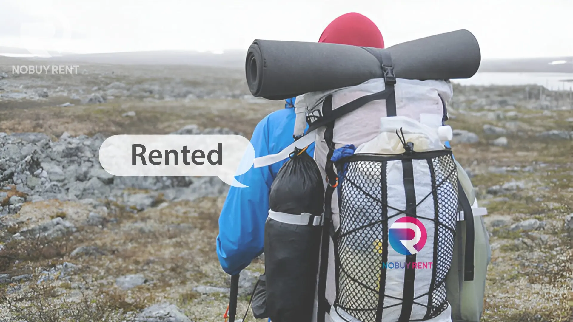 Traveler with rented backpack and gear on a mountain
